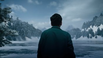 Movie still from “Escape Room” (2019), directed by Adam Robitel – A man standing in front of a body of water; Extreme Wide shot, Low angle