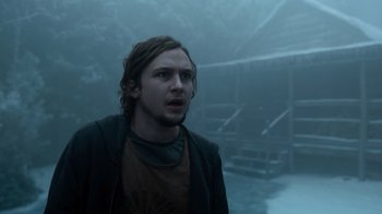 Movie still from “Escape Room” (2019), directed by Adam Robitel – A man standing in the middle of a foggy area; Close Up shot, Low angle