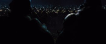 Movie still from “Thor” (2011), directed by Kenneth Branagh – A large group of cows in a dark field; Extreme Wide shot, High angle