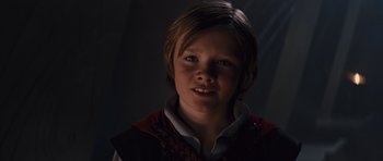 Movie still from “Thor” (2011), directed by Kenneth Branagh – A young boy is looking into the camera; Close Up shot, Low angle