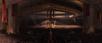 Movie still from “Thor” (2011), directed by Kenneth Branagh – A large crowd of people in an auditorium; Extreme Wide shot, High angle