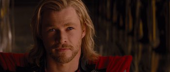 Movie still from “Thor” (2011), directed by Kenneth Branagh – A person with long blonde hair; Close Up shot, Over the shoulder angle