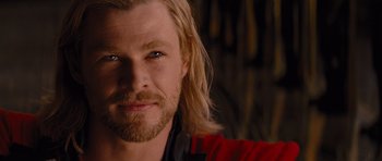 Movie still from “Thor” (2011), directed by Kenneth Branagh – A person with long blonde hair; Close Up shot, Over the shoulder angle