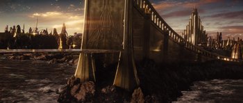 Movie still from “Thor” (2011), directed by Kenneth Branagh – A bridge that has a bench on top of it; Extreme Wide shot, Low angle