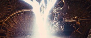 Movie still from “Thor” (2011), directed by Kenneth Branagh – A statue of a man with a helmet on his head; Medium shot, Low angle