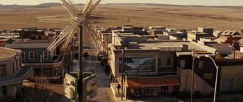 Movie still from “Thor” (2011), directed by Kenneth Branagh – An aerial view of a city street with a ferris wheel; Extreme Wide shot, High angle