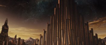 Movie still from “Thor” (2011), directed by Kenneth Branagh – A tall building with a sky filled with lots of stars; Extreme Wide shot, Low angle