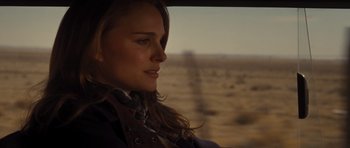 Movie still from “Thor” (2011), directed by Kenneth Branagh – A beautiful young woman sitting in a vehicle; Close Up shot, Over the shoulder angle