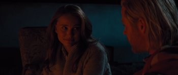 Movie still from “Thor” (2011), directed by Kenneth Branagh – A woman in a white sweater and a man in a black shirt; Close Up shot, Over the shoulder angle