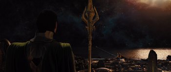 Movie still from “Thor” (2011), directed by Kenneth Branagh – A man standing in front of a sky filled with stars; Wide shot, High angle