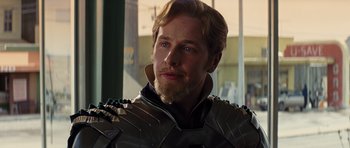Movie still from “Thor” (2011), directed by Kenneth Branagh – A person with a beard wearing armor; Close Up shot, Over the shoulder angle