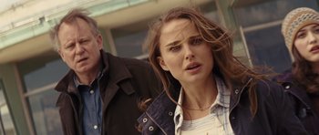 Movie still from “Thor” (2011), directed by Kenneth Branagh – A man and a woman walking down a street; Close Up shot, Over the shoulder angle