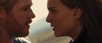 Movie still from “Thor” (2011), directed by Kenneth Branagh – A man and a woman face to face in the sunlight; Close Up shot, Over the shoulder angle