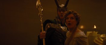 Movie still from “Thor” (2011), directed by Kenneth Branagh – A man and woman dressed up as thor and loki; Medium shot, Low angle