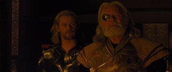 Movie still from “Thor” (2011), directed by Kenneth Branagh – Two men dressed up as thor and odin; Close Up shot, Low angle