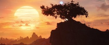 Movie still from “Thor: Love and Thunder” (2022), directed by Taika Waititi – A tree on top of a mountain at sunset; Extreme Wide shot, Low angle