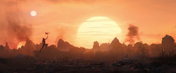 Movie still from “Thor: Love and Thunder” (2022), directed by Taika Waititi – The sun is setting in the desert with mountains in the background; Extreme Wide shot, Low angle