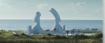 Movie still from “Thor: Love and Thunder” (2022), directed by Taika Waititi – People are standing on the shore of a body of water; Extreme Wide shot, Low angle