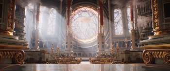 Movie still from “Thor: Love and Thunder” (2022), directed by Taika Waititi – A room filled with gold furniture and a large window; Extreme Wide shot, High angle