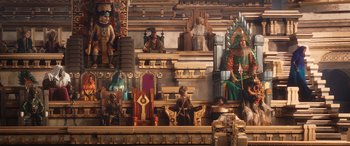 Movie still from “Thor: Love and Thunder” (2022), directed by Taika Waititi – A wall with a lot of statues on the wall; Extreme Wide shot, High angle