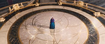 Movie still from “Thor: Love and Thunder” (2022), directed by Taika Waititi – A woman in a blue robe stands in a circle; Extreme Wide shot, High angle