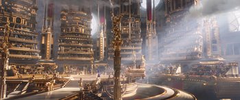 Movie still from “Thor: Love and Thunder” (2022), directed by Taika Waititi – A statue of a person in a large room; Extreme Wide shot, High angle