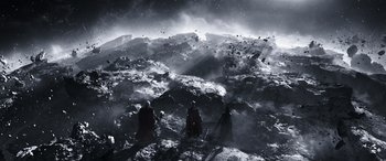 Movie still from “Thor: Love and Thunder” (2022), directed by Taika Waititi – A group of people standing on top of a snow covered slope; Extreme Wide shot, High angle