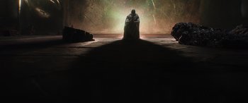 Movie still from “Thor: Love and Thunder” (2022), directed by Taika Waititi – A man is standing in front of a light; Extreme Wide shot, High angle