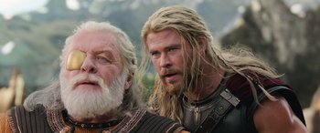 Movie still from “Thor: Ragnarok” (2017), directed by Taika Waititi – Two men with long blonde hair and beards; Close Up shot, Low angle
