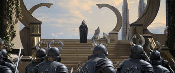 Movie still from “Thor: Ragnarok” (2017), directed by Taika Waititi – A woman dressed in black standing on some steps; Wide shot, High angle