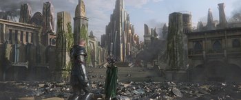 Movie still from “Thor: Ragnarok” (2017), directed by Taika Waititi – A scene of a city with a lot of buildings and people; Extreme Wide shot, High angle