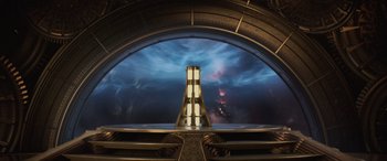 Movie still from “Thor: Ragnarok” (2017), directed by Taika Waititi – A view of a space ship from the inside of a building; Extreme Wide shot, Low angle