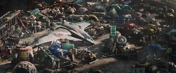 Movie still from “Thor: Ragnarok” (2017), directed by Taika Waititi – An overhead view of a pile of junk; Extreme Wide shot, Overhead angle