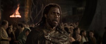 Movie still from “Thor: Ragnarok” (2017), directed by Taika Waititi – A person with a dreadlocks; Close Up shot, Low angle