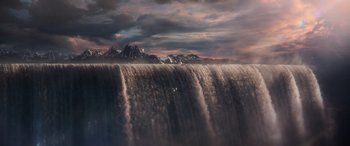 Movie still from “Thor: Ragnarok” (2017), directed by Taika Waititi – A large waterfall in the middle of the night; Extreme Wide shot, Low angle