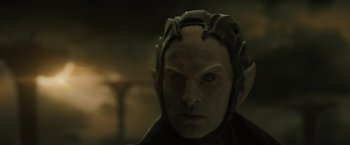 Movie still from “Thor: The Dark World” (2013), directed by Alan Taylor – A person wearing a helmet; Close Up shot, Low angle
