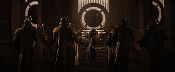 Movie still from “Thor: The Dark World” (2013), directed by Alan Taylor – A group of people dressed up in costumes; Wide shot, Low angle