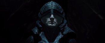 Movie still from “Thor: The Dark World” (2013), directed by Alan Taylor – A man wearing a helmet and a black jacket; Close Up shot, Overhead angle