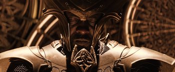 Movie still from “Thor: The Dark World” (2013), directed by Alan Taylor – A person wearing a helmet; Close Up shot, Overhead angle