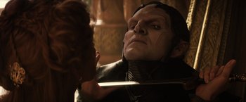 Movie still from “Thor: The Dark World” (2013), directed by Alan Taylor – A man is looking at himself in the mirror; Close Up shot, Low angle