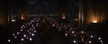 Movie still from “Thor: The Dark World” (2013), directed by Alan Taylor – A group of people standing on top of a bridge; Extreme Wide shot, High angle