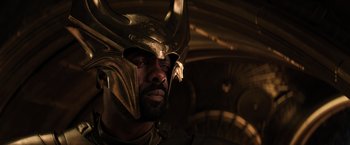 Movie still from “Thor: The Dark World” (2013), directed by Alan Taylor – A person wearing a helmet; Close Up shot, Low angle
