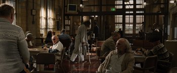 Movie still from “Thor: The Dark World” (2013), directed by Alan Taylor – A group of people sitting in a room; Wide shot, Over the shoulder angle