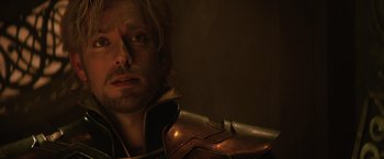 Movie still from “Thor: The Dark World” (2013), directed by Alan Taylor – A person wearing a helmet; Close Up shot, Low angle