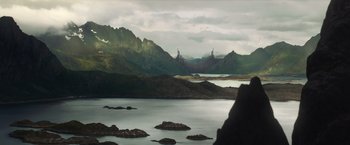 Movie still from “Thor: The Dark World” (2013), directed by Alan Taylor – A view of a lake with mountains in the background; Extreme Wide shot, Low angle