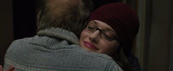 Movie still from “Thor: The Dark World” (2013), directed by Alan Taylor – A woman wearing glasses and a hat is laying on a man's chest; Close Up shot, Over the shoulder angle