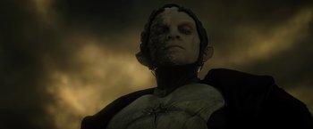 Movie still from “Thor: The Dark World” (2013), directed by Alan Taylor – A person wearing a mask; Close Up shot, Low angle