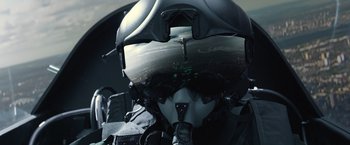 Movie still from “Thor: The Dark World” (2013), directed by Alan Taylor – The reflection of a fighter jet pilot in a helmet; Close Up shot, Low angle