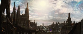 Movie still from “Thor: The Dark World” (2013), directed by Alan Taylor – An image of a city with a lot of buildings in the background; Extreme Wide shot, High angle