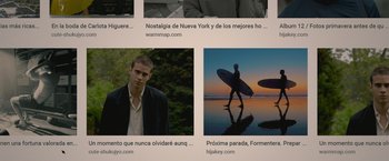 Movie still from “Through My Window” (2022), directed by Marçal Forés – A man with a surfboard in front of some trees; Extreme Close Up shot, Low angle
